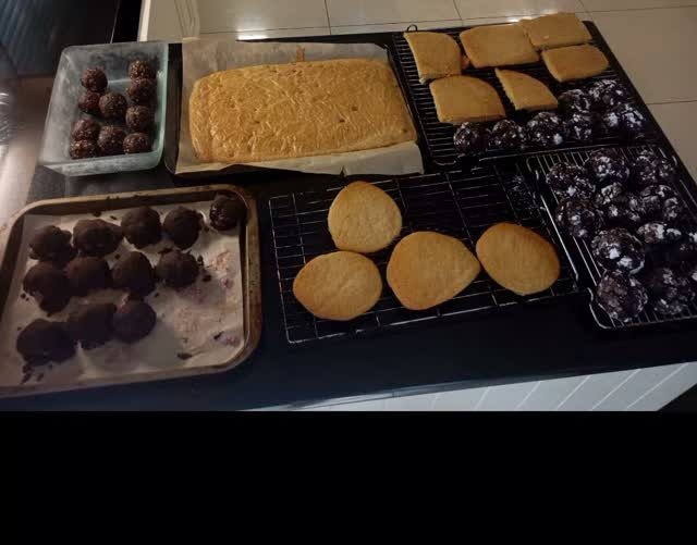 Trays of brownies, cookies and traybakes ready for collection